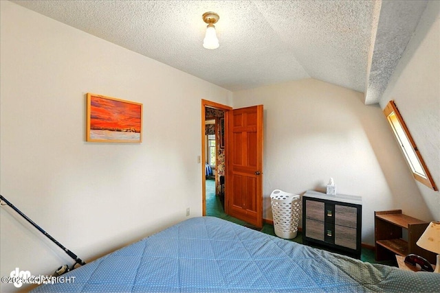 21033 Sterling Hwy, Ninilchik, AK 99639 - bedroom featuring vaulted ceiling, a textured ceiling, and carpet