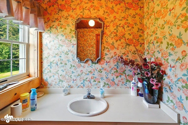 21033 Sterling Hwy, Ninilchik, AK 99639 - bathroom featuring wallpapered walls and vanity