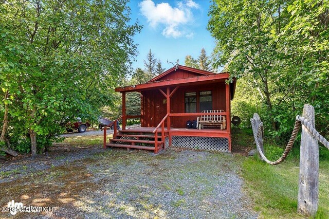 21033 Sterling Hwy, Ninilchik, AK 99639 - view of front of house with covered porch