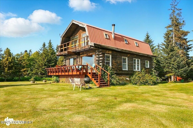 21033 Sterling Hwy, Ninilchik, AK 99639 - rear view of property featuring a gambrel roof, a lawn, a deck, a metal roof, and a balcony