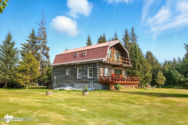 21033 Sterling Hwy, Ninilchik, AK 99639 - rear view of house with a gambrel roof, a balcony, a yard, and a metal roof