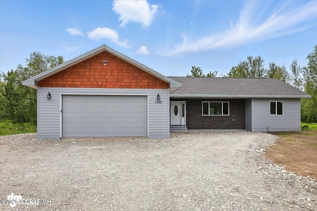 1380 N Cedar Hills Dr, Palmer, AK 99645 - view of front of property with a shingled roof and gravel driveway