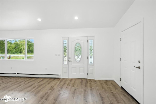 1380 N Cedar Hills Dr, Palmer, AK 99645 - foyer featuring a baseboard heating unit, healthy amount of natural light, wood finished floors, and recessed lighting