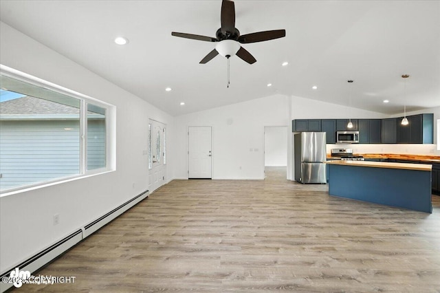 1380 N Cedar Hills Dr, Palmer, AK 99645 - kitchen with appliances with stainless steel finishes, baseboard heating, recessed lighting, light wood finished floors, and a ceiling fan