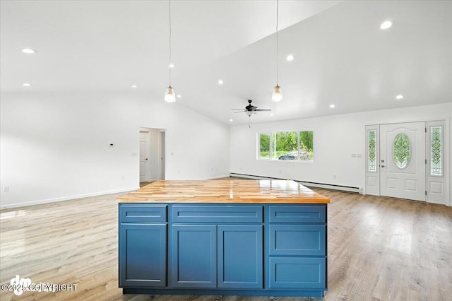 1380 N Cedar Hills Dr, Palmer, AK 99645 - kitchen featuring open floor plan, wood counters, light wood-style flooring, vaulted ceiling, and ceiling fan