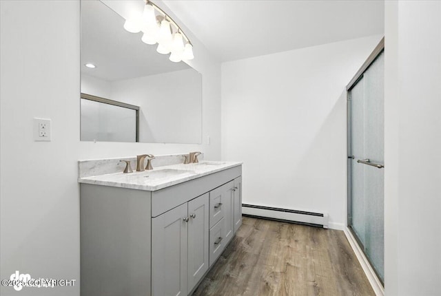 1380 N Cedar Hills Dr, Palmer, AK 99645 - full bath featuring baseboard heating, double vanity, wood finished floors, and an enclosed shower