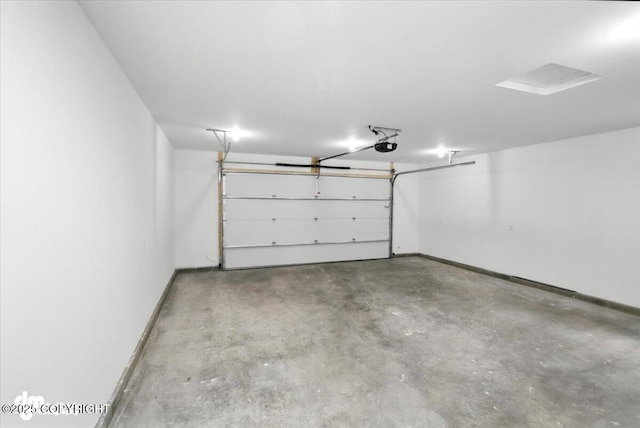 1380 N Cedar Hills Dr, Palmer, AK 99645 - garage featuring baseboards and a garage door opener