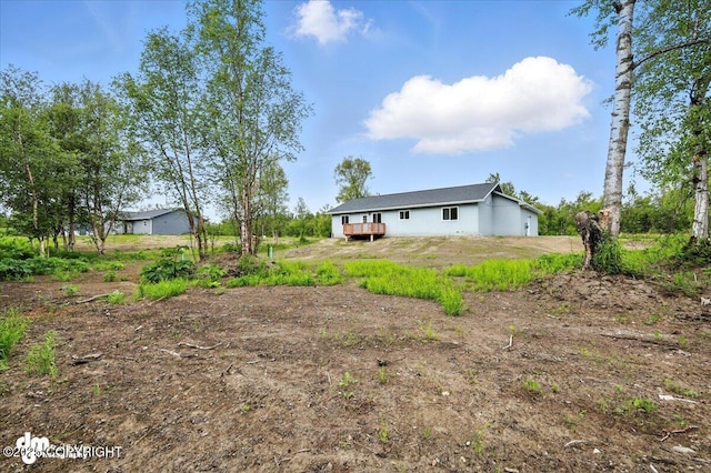 1380 N Cedar Hills Dr, Palmer, AK 99645 - back of house featuring an attached garage