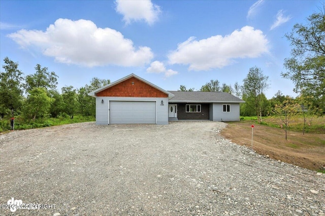 1380 N Cedar Hills Dr, Palmer, AK 99645 - view of front facade with an attached garage and driveway