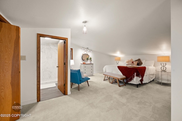 900 W Selina Ln, Wasilla, AK 99654 - carpeted bedroom featuring lofted ceiling and ensuite bath
