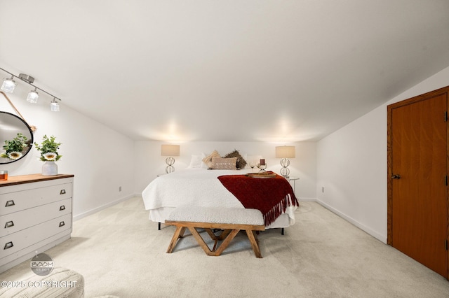 900 W Selina Ln, Wasilla, AK 99654 - bedroom with light carpet and vaulted ceiling