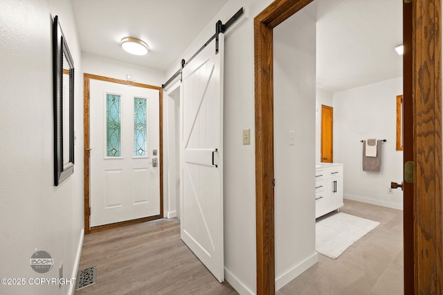 900 W Selina Ln, Wasilla, AK 99654 - hallway with a barn door and baseboards
