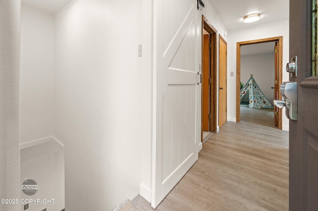 900 W Selina Ln, Wasilla, AK 99654 - corridor with light wood finished floors and baseboards