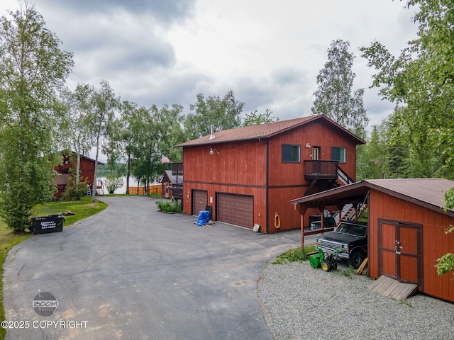900 W Selina Ln, Wasilla, AK 99654 - view of property exterior featuring a detached garage and a metal roof
