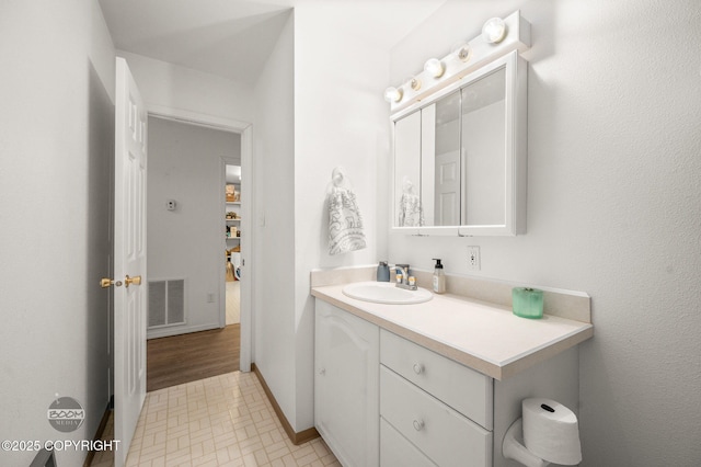 900 W Selina Ln, Wasilla, AK 99654 - bathroom with vanity and baseboards