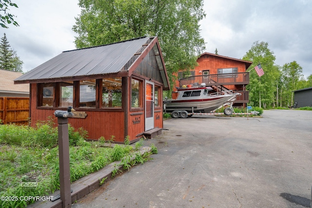 900 W Selina Ln, Wasilla, AK 99654 - view of property exterior featuring a metal roof and an outbuilding