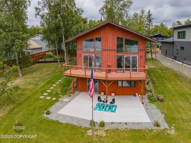 900 W Selina Ln, Wasilla, AK 99654 - back of property featuring a patio area and a wooden deck