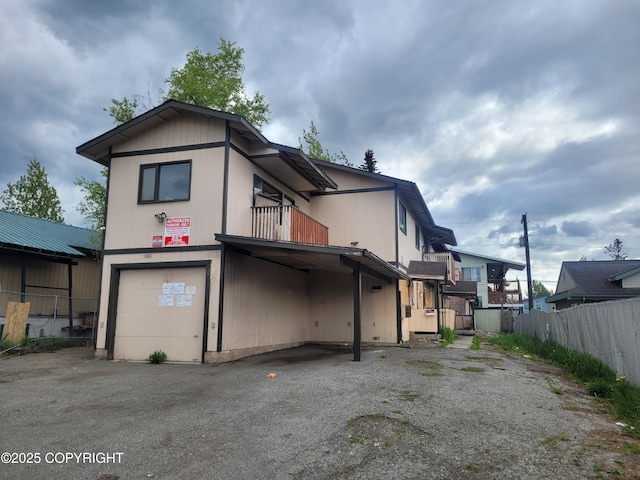 3802 Peterkin Ave, Anchorage, AK 99508 - rear view of house featuring an attached garage