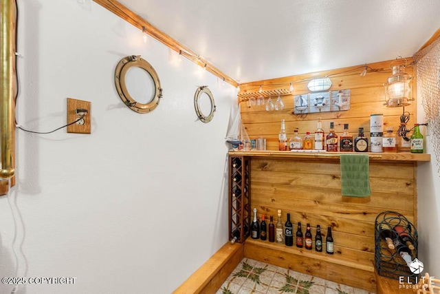 17311 Bonasila Cir, Eagle River, AK 99577 - indoor dry bar with wooden walls