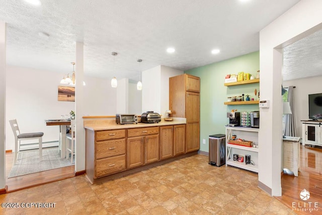 17311 Bonasila Cir, Eagle River, AK 99577 - kitchen featuring a baseboard radiator, open shelves, brown cabinets, light countertops, and decorative light fixtures