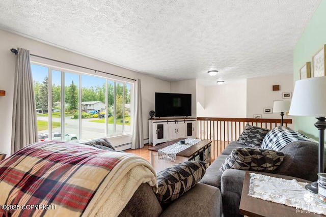 17311 Bonasila Cir, Eagle River, AK 99577 - living area with a baseboard radiator, a textured ceiling, wood finished floors, and a baseboard heating unit