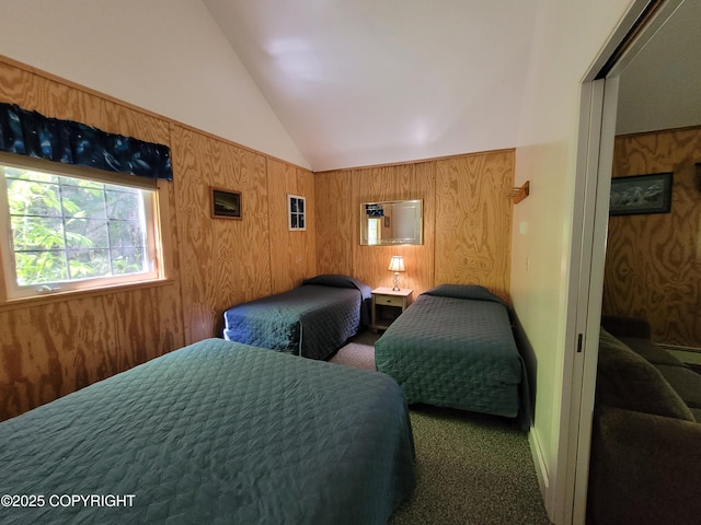 13925 Ravenquest Ave, Seward, AK 99664 - bedroom featuring lofted ceiling, carpet flooring, and wooden walls