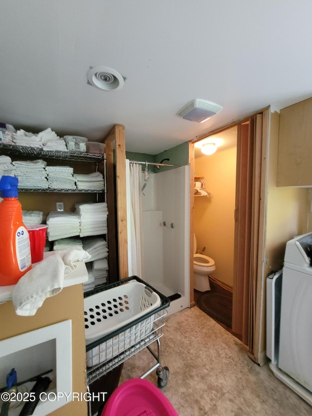 13925 Ravenquest Ave, Seward, AK 99664 - bathroom with a stall shower and toilet