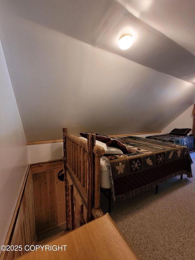 13925 Ravenquest Ave, Seward, AK 99664 - bedroom with vaulted ceiling and carpet