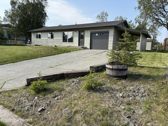1510 Fathom Dr, Kenai, AK 99611 - single story home with an attached garage, concrete driveway, and a front lawn