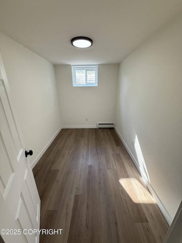 1510 Fathom Dr, Kenai, AK 99611 - below grade area with baseboard heating and wood finished floors
