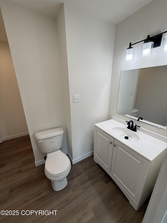 1510 Fathom Dr, Kenai, AK 99611 - half bath featuring vanity and wood finished floors