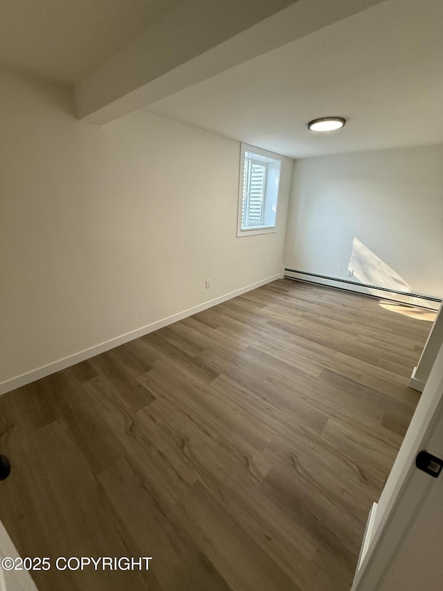 1510 Fathom Dr, Kenai, AK 99611 - spare room with a baseboard radiator and wood finished floors