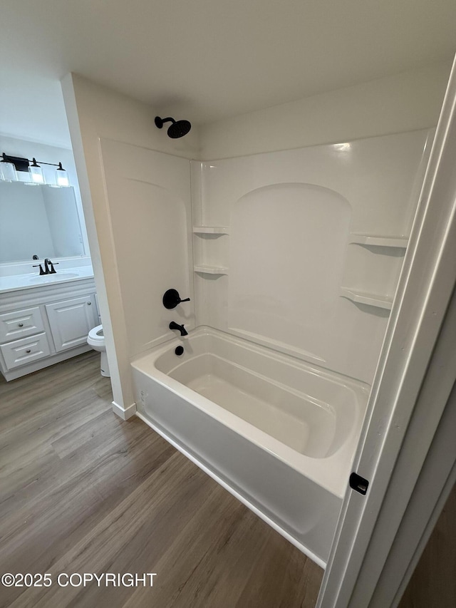 1510 Fathom Dr, Kenai, AK 99611 - bathroom with shower / bath combination, vanity, and wood finished floors
