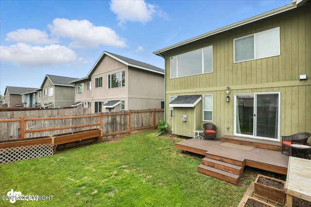 339 Skwentna Dr # 24, Anchorage, AK 99504 - back of house featuring a deck, a shed, and a residential view
