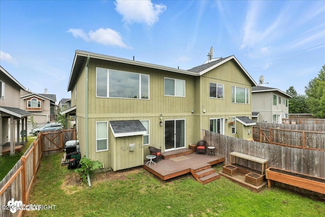 339 Skwentna Dr # 24, Anchorage, AK 99504 - back of property featuring a deck and a fenced backyard