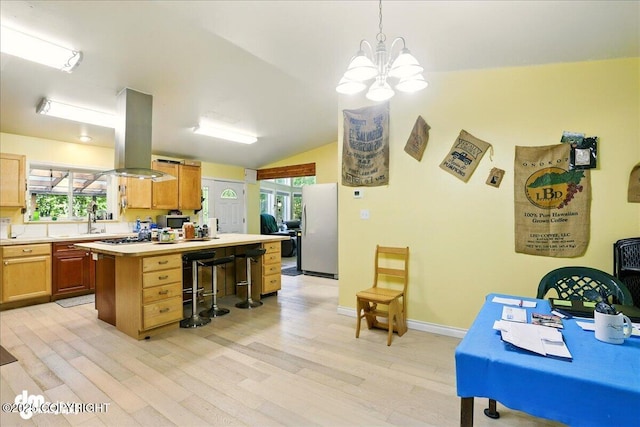 14216 W Norcross St, Big Lake, AK 99623 - kitchen with stainless steel appliances, light wood-style flooring, light countertops, island range hood, and a chandelier