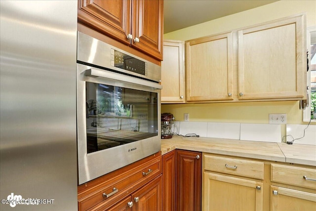 14216 W Norcross St, Big Lake, AK 99623 - kitchen featuring stainless steel appliances and light countertops