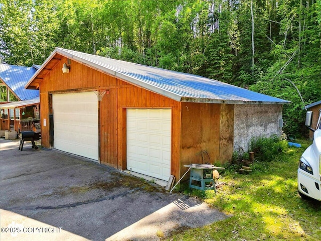 14216 W Norcross St, Big Lake, AK 99623 - detached garage with a wooded view