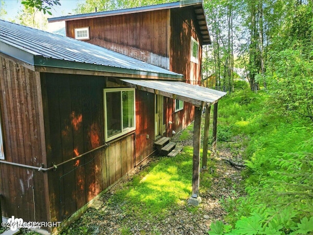 14216 W Norcross St, Big Lake, AK 99623 - view of home's exterior featuring a metal roof and entry steps