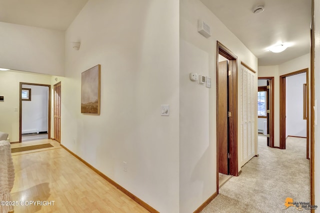 6312 Air Guard Rd, Anchorage, AK 99502 - corridor featuring baseboards and baseboard heating