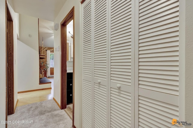 6312 Air Guard Rd, Anchorage, AK 99502 - hallway featuring carpet floors and baseboards