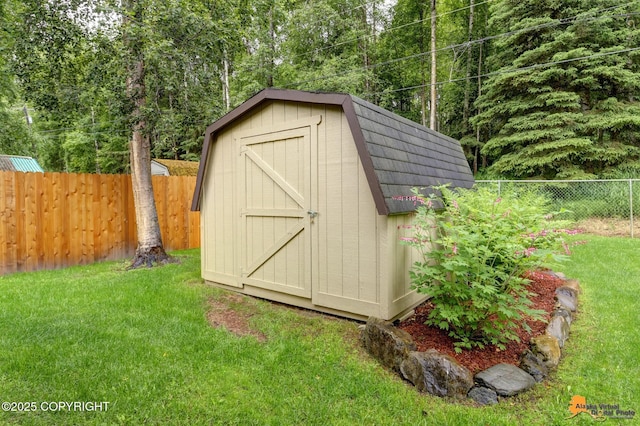 6312 Air Guard Rd, Anchorage, AK 99502 - view of shed featuring a fenced backyard