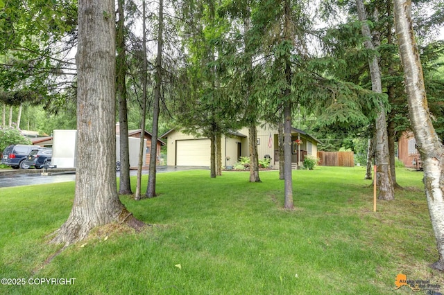 6312 Air Guard Rd, Anchorage, AK 99502 - view of yard with a garage