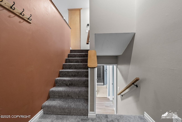 1740 Patterson Ct, Anchorage, AK 99504 - stairway featuring baseboards