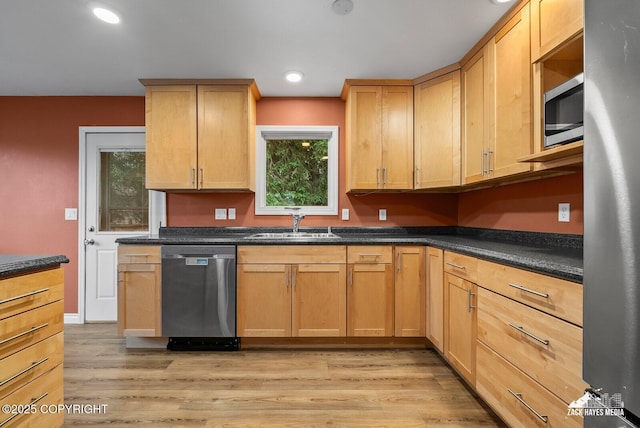 1740 Patterson Ct, Anchorage, AK 99504 - kitchen featuring appliances with stainless steel finishes, light wood-type flooring, dark countertops, recessed lighting, and light brown cabinets