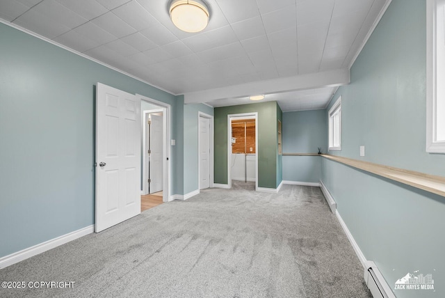 1740 Patterson Ct, Anchorage, AK 99504 - unfurnished room with carpet flooring, baseboard heating, and crown molding
