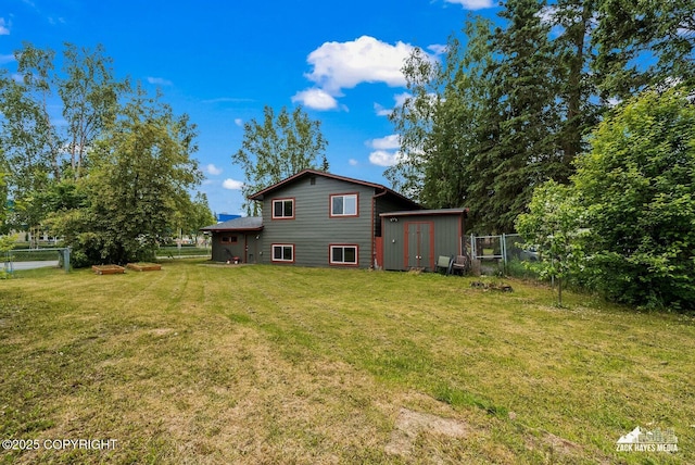 1740 Patterson Ct, Anchorage, AK 99504 - back of house featuring a storage shed