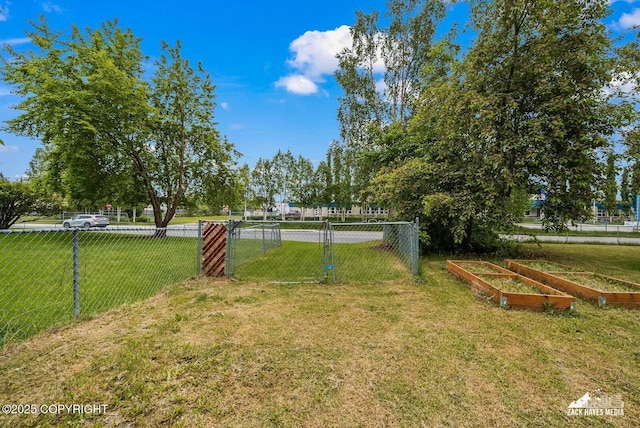 1740 Patterson Ct, Anchorage, AK 99504 - view of yard with a vegetable garden