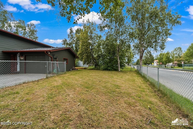 1740 Patterson Ct, Anchorage, AK 99504 - view of yard with a garage