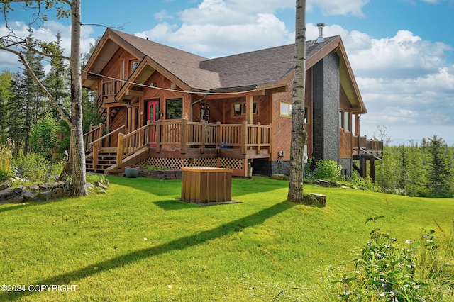 37905 Hall Rd, Sterling, AK 99672 - rear view of property with a lawn and a shingled roof